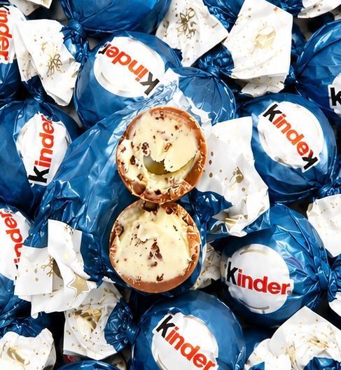 Цукерки Kinder Kugeln Milk & Crispy Bits Sensation (17 шт) 150 грам 24045 фото