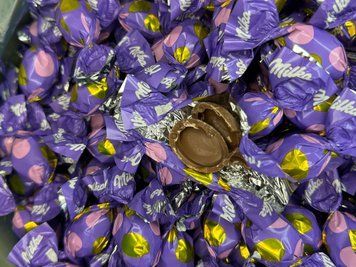 Конфеты Milka из альпийского молочного шоколада с кремовой начинкой на развес 177593 фото