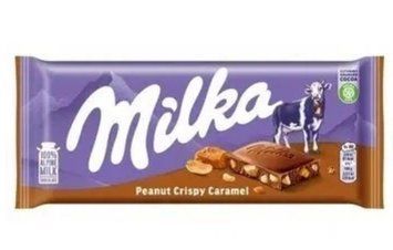 Шоколад Milka Peanut Crispy Caramel молочный с кусочками хрустящей карамели и арахисом 90 грамм 004169 фото