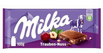 Шоколад Milka Trauben-Nuss молочный с кусочками фундука и изюмом 90 грамм 004168 фото