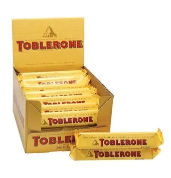 Шоколад Toblerone Mini молочний з медом та нугою 35 грам 2416 фото