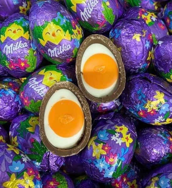 Конфеты из молочного шоколада в форме яиц с имитацией желтка Nascher-Ei Eggs (4 шт) 124 грамм 126373 фото